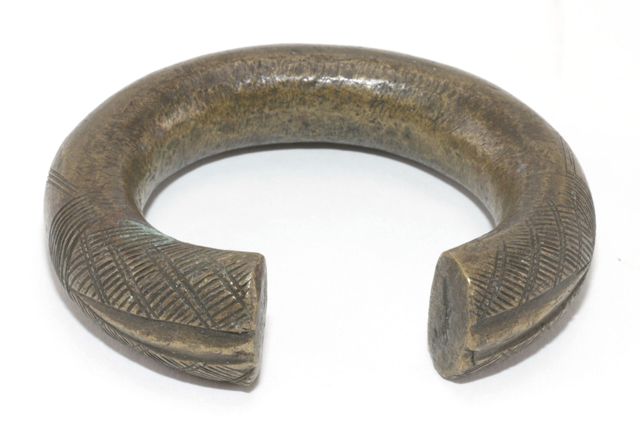 Set van vier manilla bronzen armbanden – West-Afrika – detailfoto