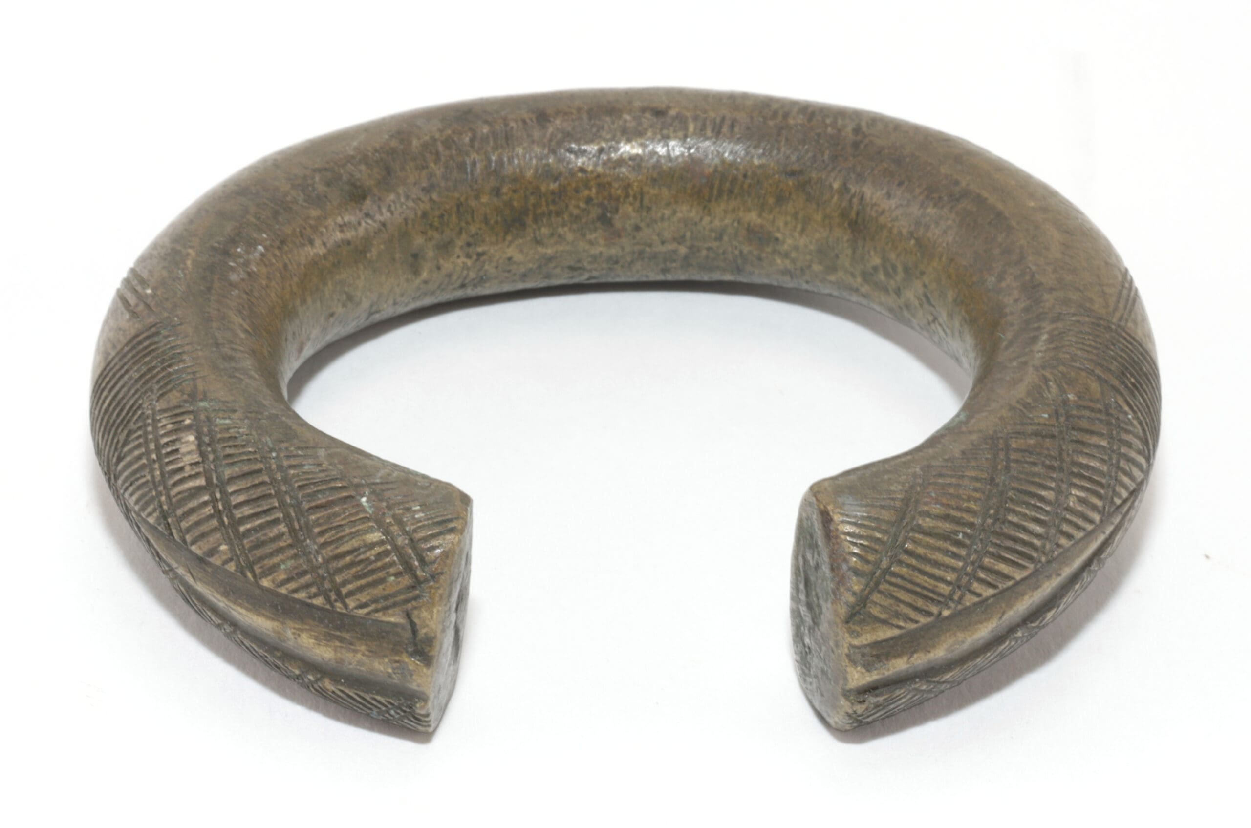 Set van vier manilla bronzen armbanden – West-Afrika – detailfoto