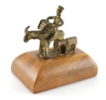 Tiboli bronze statue man on water buffalo (carabao) with calf - Philippines - detail photo