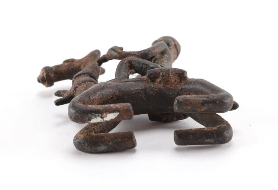 Set of three Dogon bronze statues - Mali - horseman, camel and standing figure - Vergulde Kat