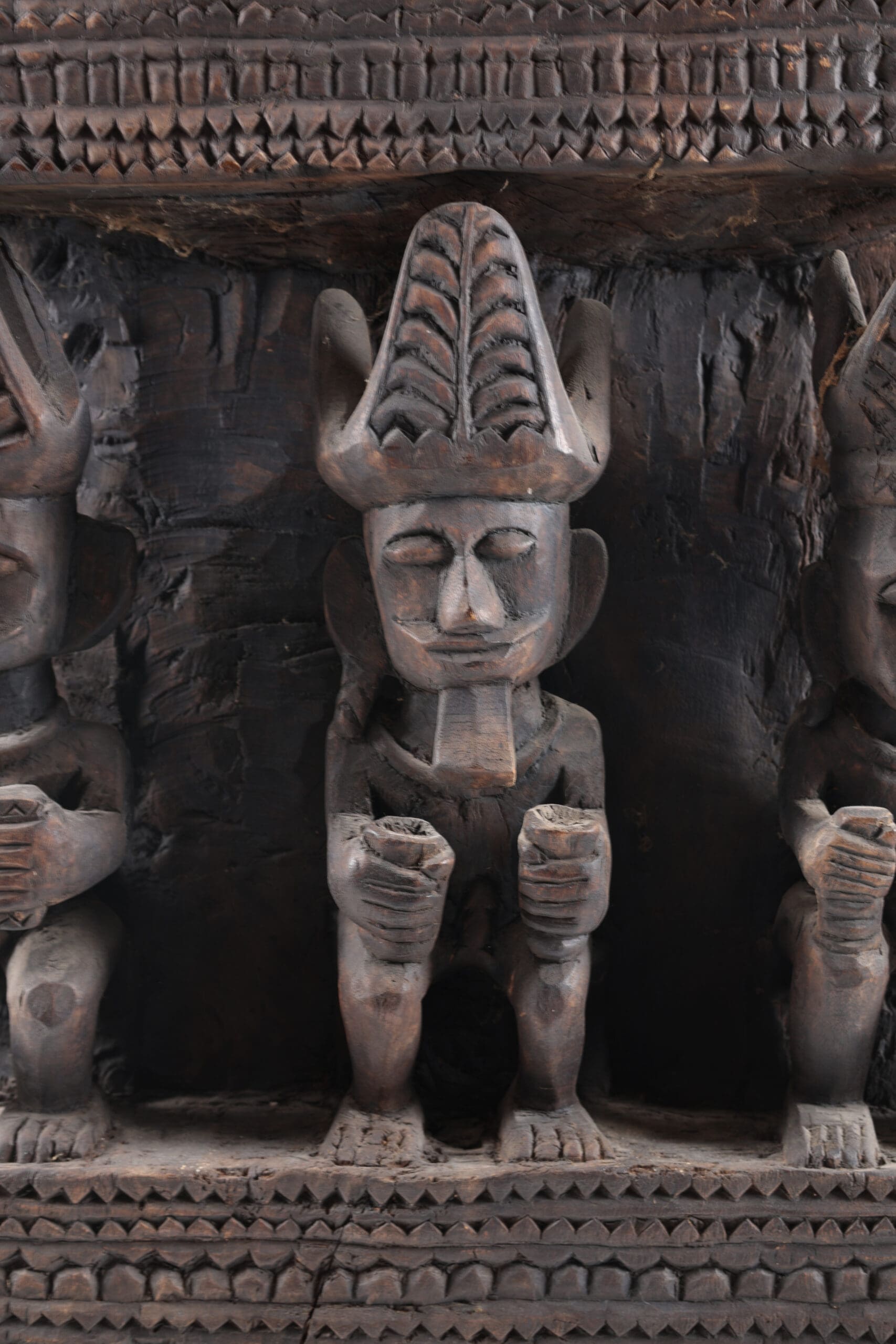 Monumental Nias panel with ancestor statues - Indonesia - detail photo
